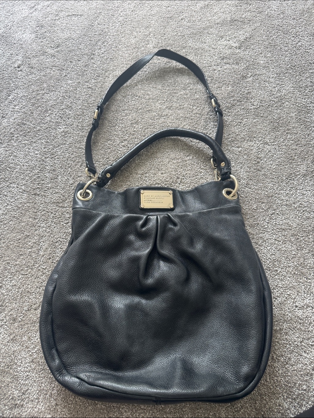 Marc Jacob’s Black Leather Hobo Bag with Gold Plaque